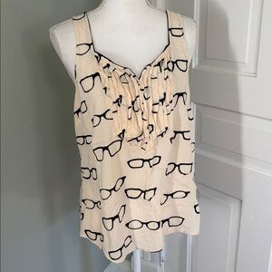 Stylish Cream Sleeveless Top with Glasses Print